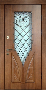 Дверь с ковкой Арт-ММ220